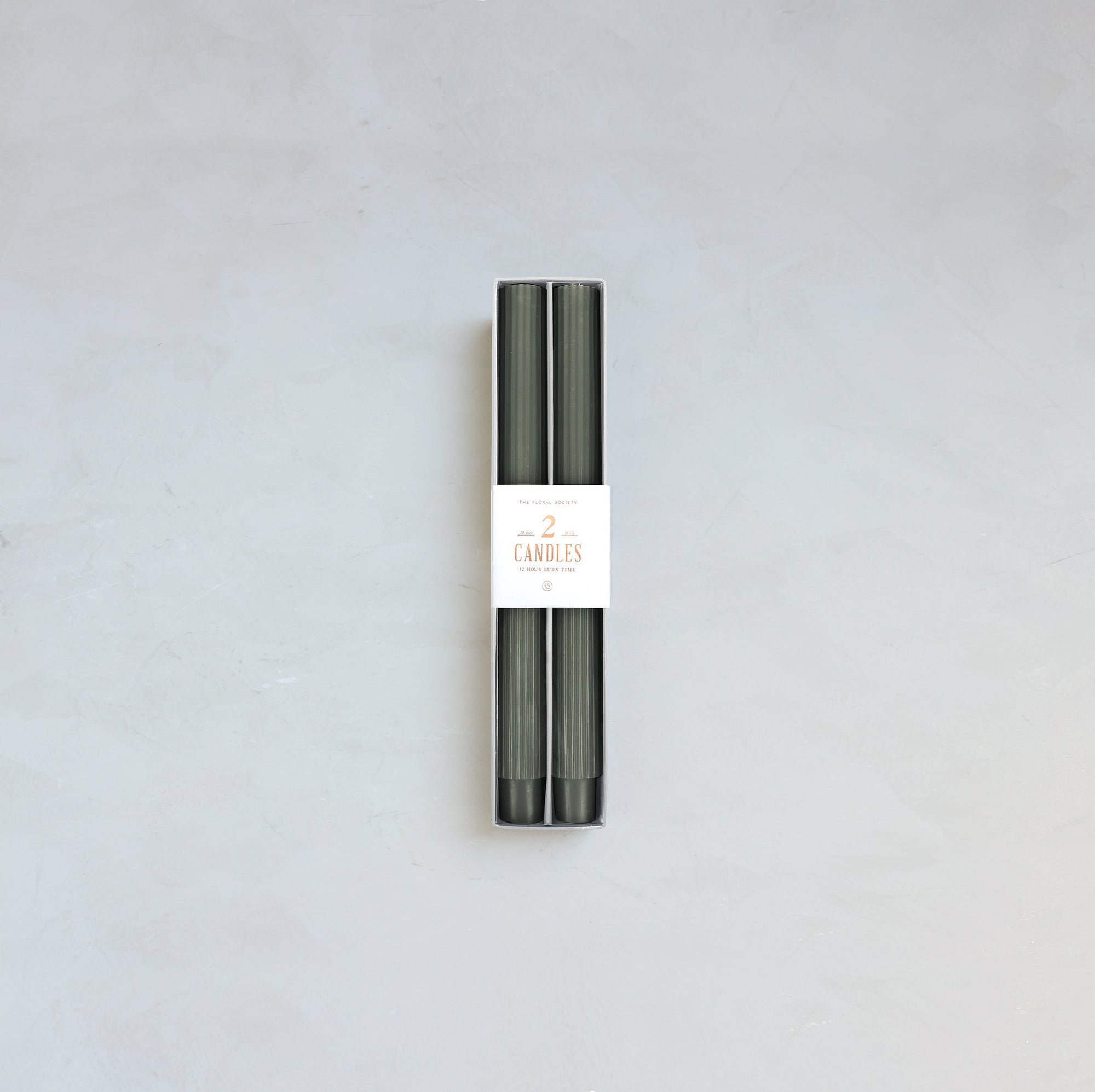 Our Fancy Taper Candles are hand-molded and embody a superior depth of color. A cotton wick is used for the cleanest burn, and the base is sized to fit a standard holder. Each 10” candle is crafted to burn for ten hours. Subtle variations in wax depth and color opacity may occur.  Two 10” candles per pack. Standard 7/8” base. Made of high grade paraffin wax.