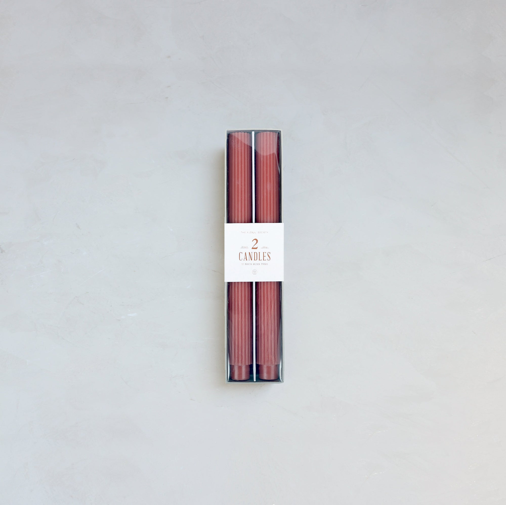 Our Fancy Taper Candles are hand-molded and embody a superior depth of color. A cotton wick is used for the cleanest burn, and the base is sized to fit a standard holder. Each 10” candle is crafted to burn for ten hours. Subtle variations in wax depth and color opacity may occur.  Two 10” candles per pack. Standard 7/8” base. Made of high grade paraffin wax.