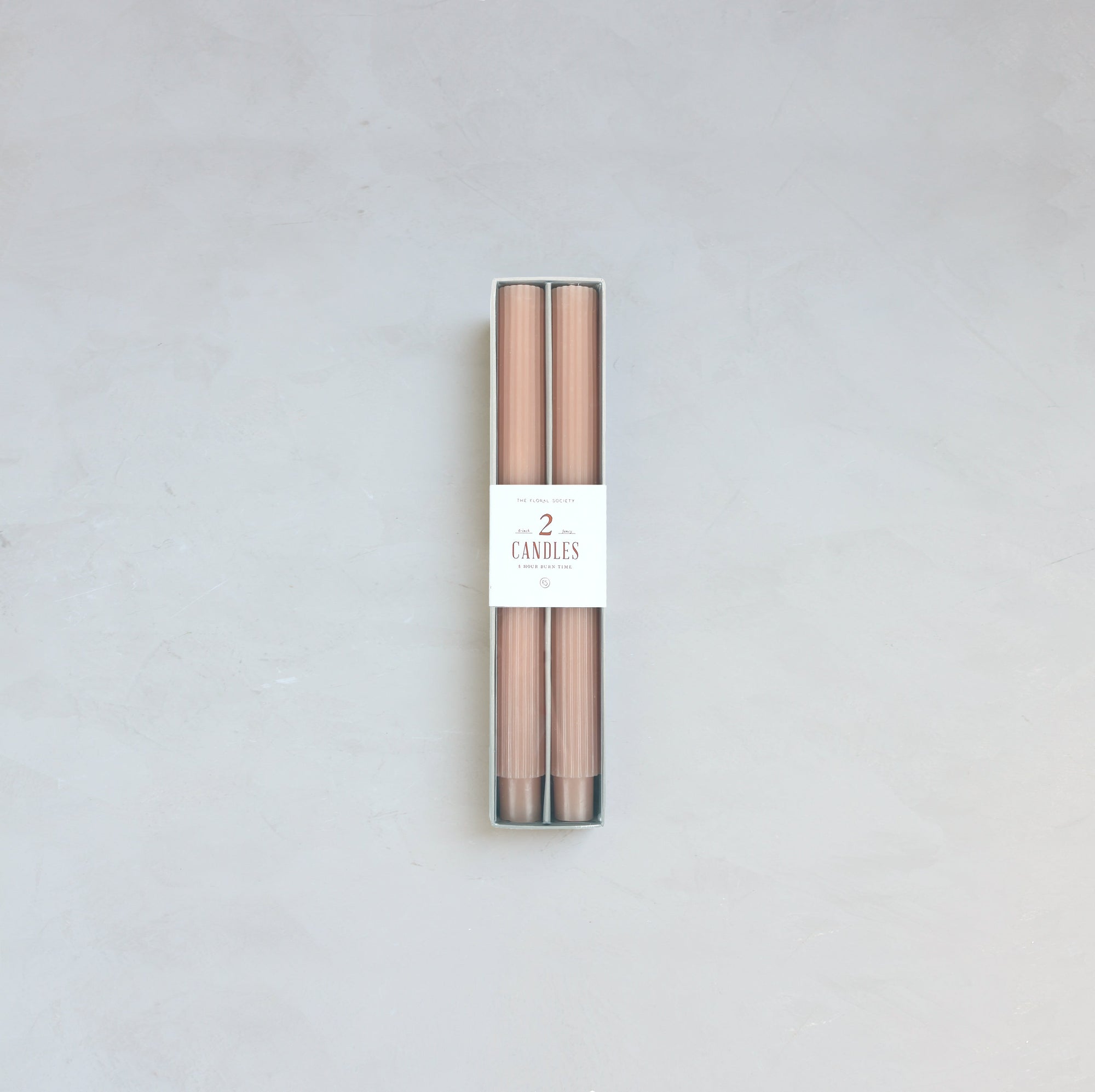 Our Fancy Taper Candles are hand-molded and embody a superior depth of color. A cotton wick is used for the cleanest burn, and the base is sized to fit a standard holder. Each 10” candle is crafted to burn for ten hours. Subtle variations in wax depth and color opacity may occur.  Two 10” candles per pack. Standard 7/8” base. Made of high grade paraffin wax.