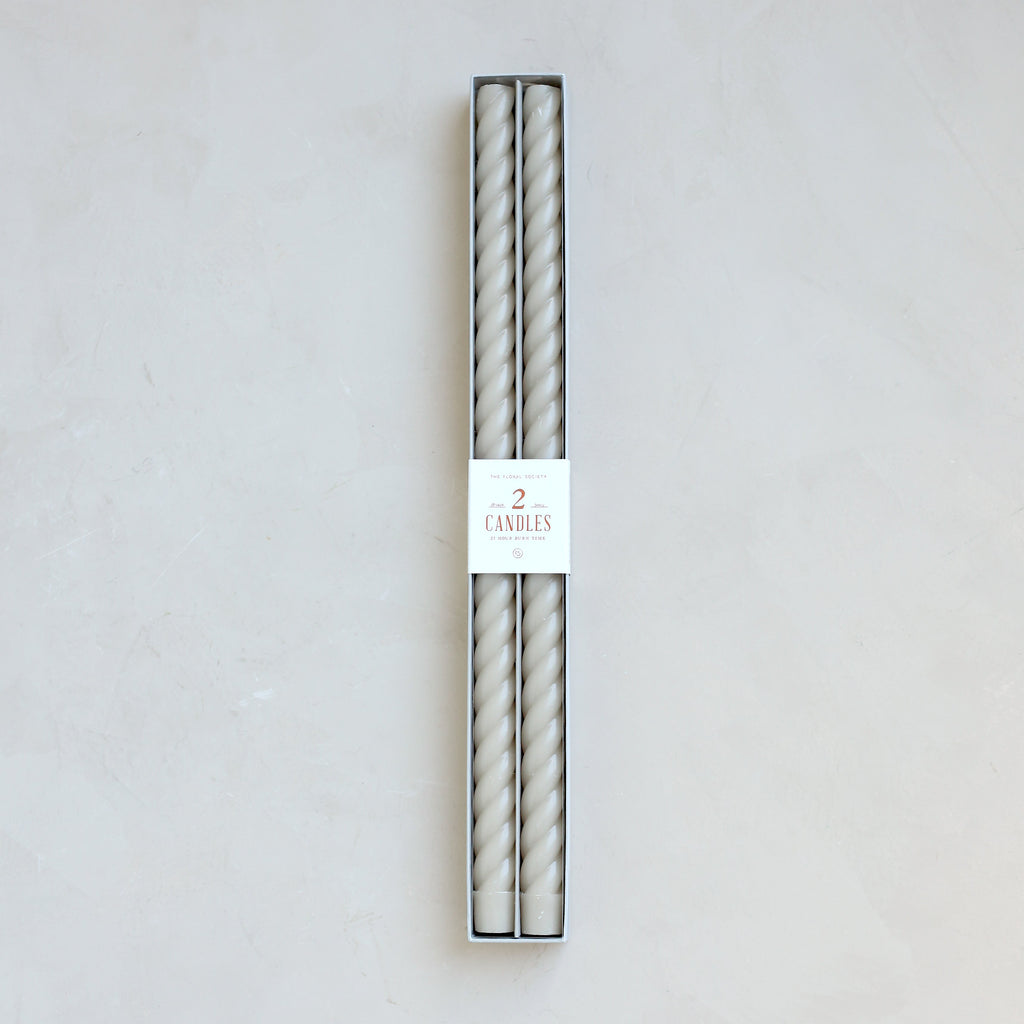 color_option-parchmentOur Fancy Taper Candles are hand-molded and embody a superior depth of color. A cotton wick is used for the cleanest burn, and the base is sized to fit a standard holder. Each 18” candle is crafted to burn for eighteen hours. Subtle variations in wax depth and color opacity may occur.  Two 18” candles per pack. Standard 7/8” base. Made of high grade paraffin wax. Parchment braided tapers