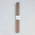 Our Fancy Taper Candles are hand-molded and embody a superior depth of color. A cotton wick is used for the cleanest burn, and the base is sized to fit a standard holder. Each 18” candle is crafted to burn for eighteen hours. Subtle variations in wax depth and color opacity may occur.  Two 18” candles per pack. Standard 7/8” base. Made of high grade paraffin wax. Petal taper braided