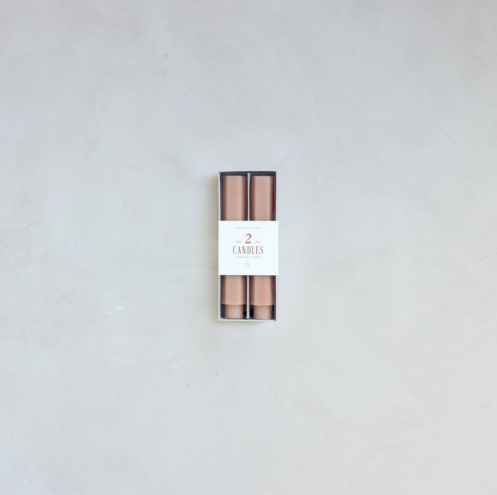 Our Fancy Taper Candles are hand-molded and embody a superior depth of color. A cotton wick is used for the cleanest burn, and the base is sized to fit a standard holder. Each 6” candle is crafted to burn for six hours. Subtle variations in wax depth and color opacity may occur.  Two 6” candles per pack. Standard 7/8” base. Made of high grade paraffin wax. Petal hexagon taper candle