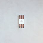 Our Fancy Taper Candles are hand-molded and embody a superior depth of color. A cotton wick is used for the cleanest burn, and the base is sized to fit a standard holder. Each 6” candle is crafted to burn for six hours. Subtle variations in wax depth and color opacity may occur.  Two 6” candles per pack. Standard 7/8” base. Made of high grade paraffin wax. Petal hexagon taper candle