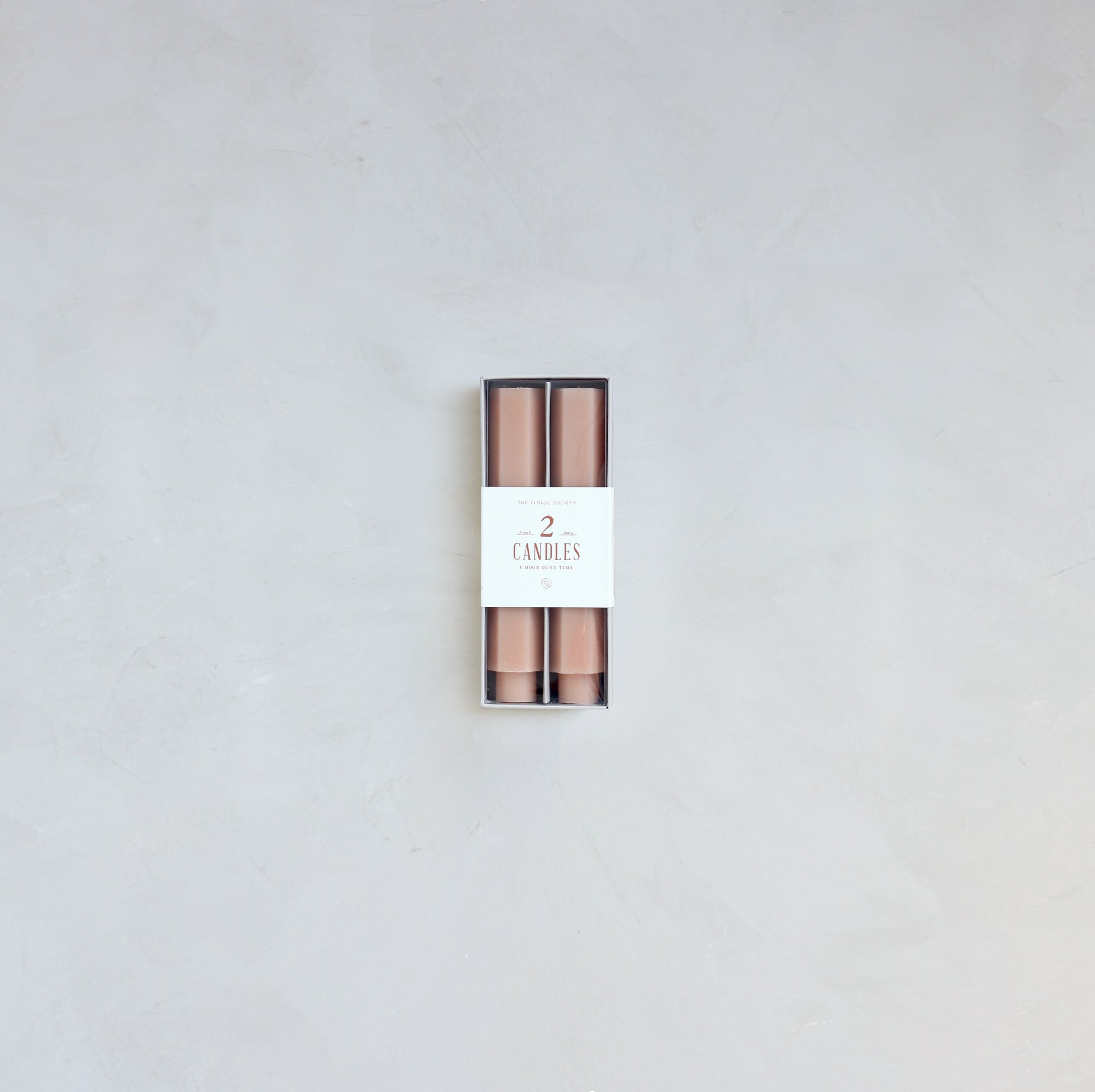 Our Fancy Taper Candles are hand-molded and embody a superior depth of color. A cotton wick is used for the cleanest burn, and the base is sized to fit a standard holder. Each 6” candle is crafted to burn for six hours. Subtle variations in wax depth and color opacity may occur.  Two 6” candles per pack. Standard 7/8” base. Made of high grade paraffin wax. Petal hexagon taper candle