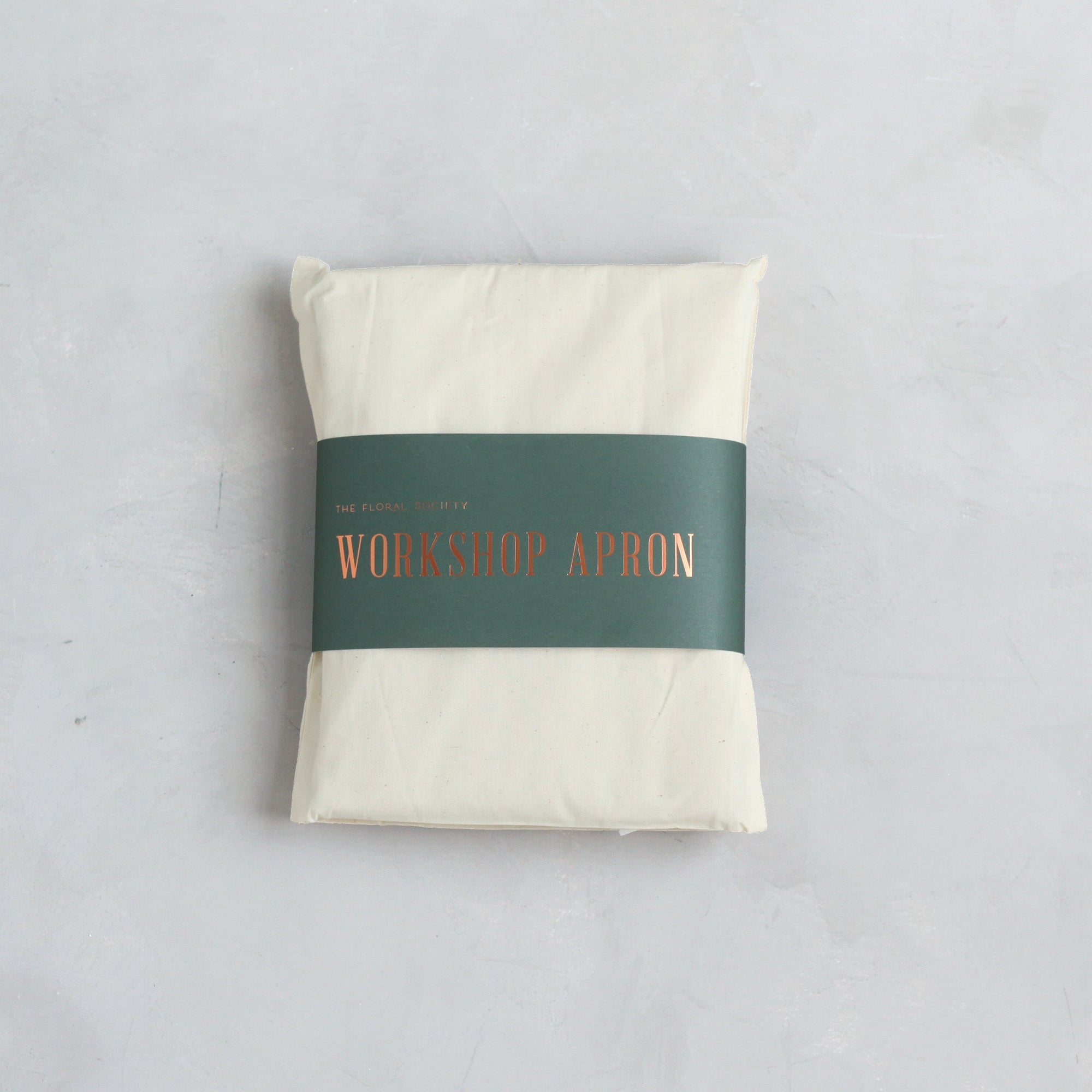 Our pure cotton, cross-back apron is both stylish and utilitarian, and designed to fit all body types. Featuring wide front pockets, it is ideal for working in the garden, kitchen, or studio. Each apron is soft-washed for added comfort. Azo-free dye.  Pure Cotton and hand sewn. Machine washable. One size fits most.
