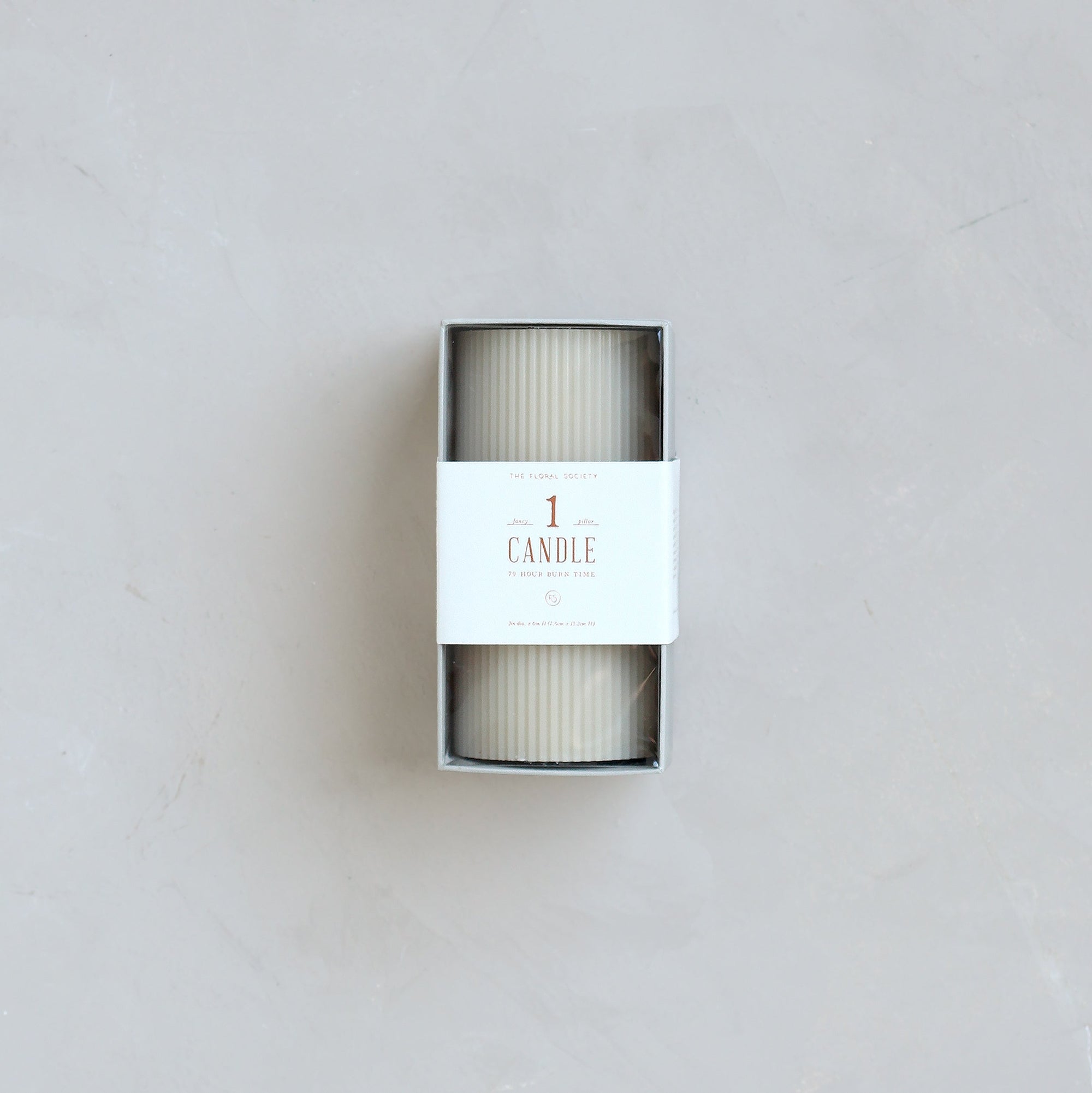 Our 3x6 ribbed pillar is a modern take on a traditional candle and embodies a superior depth of color, a cotton wick, and a 70-hour burn time.  Subtle variations in wax depth and color opacity may occur. Available in 4 custom colors: Parchment, Moss, Petal & Clay.  Dimensions: 3”W x 6”H